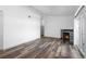 Bright living room with fireplace and hardwood flooring at 8422 S Upham Way # G60, Littleton, CO 80128