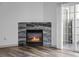 Living room fireplace and balcony at 8422 S Upham Way # G60, Littleton, CO 80128