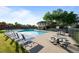 Community pool with plenty of seating and shade at 8422 S Upham Way # G60, Littleton, CO 80128
