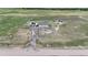 Expansive property featuring a charming house, barn, RV, and circular driveway at 11809 Pass Me By Rd, Strasburg, CO 80136