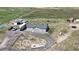 A lovely single-Gathering home featuring a barn, RV parking, and circular driveway at 11809 Pass Me By Rd, Strasburg, CO 80136
