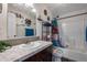 Decorated bathroom with anchor decor and modern vanity offering ample space at 11809 Pass Me By Rd, Strasburg, CO 80136