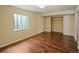 This basement has laminate floors, a walk in closet, and natural light from the window at 15594 E 97Th Ave, Commerce City, CO 80022