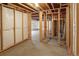 Partially framed basement offers a head start on creating additional living space, perfect for a rec room or home theater at 15594 E 97Th Ave, Commerce City, CO 80022