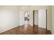 This bedroom includes an entrance to the living room and a closet at 15594 E 97Th Ave, Commerce City, CO 80022