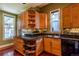 This eat-in kitchen has a large island, wood cabinets and stainless steel appliances at 233 W 3Rd Ave, Denver, CO 80223