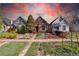 Charming street view showcasing quaint homes with colorful exteriors and landscaped front yards at 233 W 3Rd Ave, Denver, CO 80223