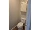 This half-bath shows the toilet and a built-in storage cabinet at 2238 S Nile Ct, Aurora, CO 80014