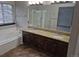 A dual vanity and soaking tub highlight this bathroom at 2238 S Nile Ct, Aurora, CO 80014
