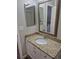Bathroom vanity featuring stylish cabinets, countertops, and mirrors, providing a modern and functional space at 2238 S Nile Ct, Aurora, CO 80014