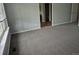 This bedroom boasts neutral walls and carpet, and an ensuite bathroom at 2238 S Nile Ct, Aurora, CO 80014