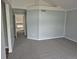An additional bedroom shows neutral paint and carpet throughout at 2238 S Nile Ct, Aurora, CO 80014