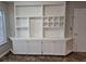 Spacious and bright built-in shelving unit that provides generous storage and display options at 2238 S Nile Ct, Aurora, CO 80014