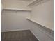 This closet is ready for storage with rods and a shelf at 2238 S Nile Ct, Aurora, CO 80014