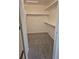 This walk-in closet features shelving and hanging rods at 2238 S Nile Ct, Aurora, CO 80014