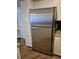 Modern kitchen featuring stainless steel appliances and ample cabinet space at 2238 S Nile Ct, Aurora, CO 80014