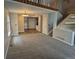 Open living room with modern gray carpet and view to kitchen, showcasing an inviting and comfortable living space at 2238 S Nile Ct, Aurora, CO 80014