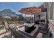 Backyard patio featuring a fire pit, patio furniture, and lounging area at 4840 Point Mesa St, Castle Rock, CO 80108