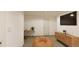 Finished basement with a large TV, a desk, and a beanbag chair at 22311 E 38Th Pl, Aurora, CO 80019