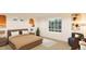 Spacious bedroom with large window and plush bedding at 22311 E 38Th Pl, Aurora, CO 80019