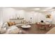 Open living room and kitchen with neutral colors and modern fixtures at 22311 E 38Th Pl, Aurora, CO 80019
