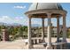 Stone gazebo offering panoramic mountain views and comfortable seating at 8387 Fig St, Arvada, CO 80005
