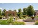 Community park with gazebo, walking path, and water feature at 8387 Fig St, Arvada, CO 80005