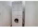 Stackable washer and dryer in a dedicated laundry closet at 35-37 S Washington St, Denver, CO 80209