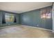 Large, empty bedroom with two windows for natural light at 904 S Walden Way # 203, Aurora, CO 80017