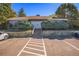 The clubhouse at the end of a walkway offers a place for residents to gather and relax at 904 S Walden Way # 203, Aurora, CO 80017