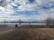 Tranquil lakefront property with mountain views at 6397 Ute Hwy, Longmont, CO 80503