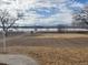Serene view of lake and surrounding landscape at 6397 Ute Hwy, Longmont, CO 80503