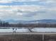 Scenic view of lake and distant mountains at 6397 Ute Hwy, Longmont, CO 80503