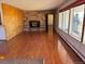 Living room with hardwood floors and large windows at 6397 Ute Hwy, Longmont, CO 80503