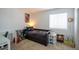 Cozy bedroom with a daybed, small desk, and bright natural light, perfect for a room at 26985 E Bayaud Ave, Aurora, CO 80018