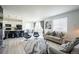 Bright, open living space with kitchen, dining, and comfortable seating areas at 26985 E Bayaud Ave, Aurora, CO 80018