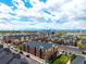 Sprawling apartment complex showcases the city skyline view from an elevated perspective at 4100 Albion St # 523, Denver, CO 80216