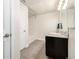 Bathroom featuring a granite vanity, vinyl floor, and a bathtub with a shower at 4100 Albion St # 523, Denver, CO 80216