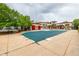 This community pool is located near the clubhouse and surrounded by trees for privacy at 4100 Albion St # 523, Denver, CO 80216