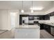 Modern kitchen features stainless steel appliances and granite countertops at 4100 Albion St # 523, Denver, CO 80216