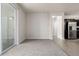 Open floor plan features living room with balcony and kitchen with stainless steel appliances at 4100 Albion St # 523, Denver, CO 80216