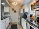Kitchen with stainless steel appliances and ample countertop space at 4108 S Rifle Way, Aurora, CO 80013