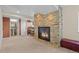 Basement featuring a stone fireplace and partially finished bathroom at 1271 Berganot Trl, Castle Pines, CO 80108