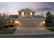 Charming two-story home featuring a three-car garage and well-maintained landscaping at 1271 Berganot Trl, Castle Pines, CO 80108
