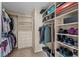 Walk-in closet featuring ample shelving and hanging storage space at 1271 Berganot Trl, Castle Pines, CO 80108