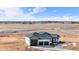 Luxury ranch home with a 3-car garage and private lot at 30410 E 161St Ave, Brighton, CO 80603