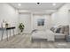 Bright bedroom with a large bed, neutral decor, and ample natural light at 30410 E 161St Ave, Brighton, CO 80603