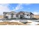 Stunning ranch home with stone accents and a 3-car garage at 30410 E 161St Ave, Brighton, CO 80603