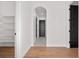 Bright hallway with hardwood floors and storage at 30410 E 161St Ave, Brighton, CO 80603