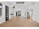 Bright living room with hardwood floors and a fireplace at 30410 E 161St Ave, Brighton, CO 80603